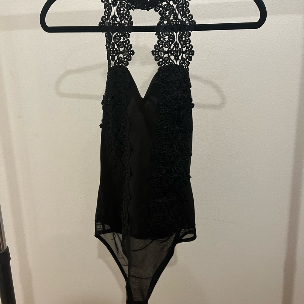 Bodysuit with textured neck design